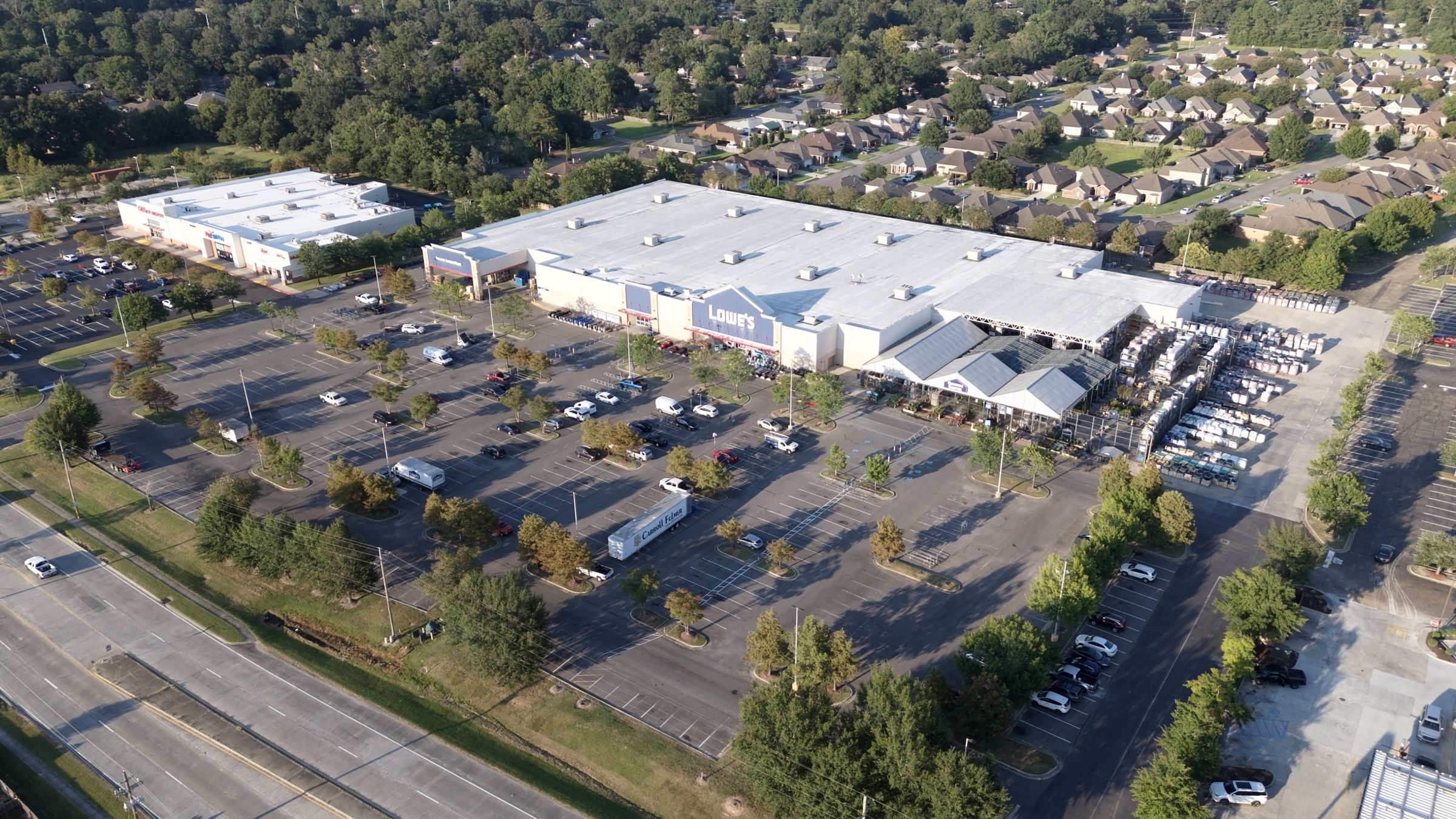 Lowe's, aerial view of the storefront, garden center, and parking lot plantings