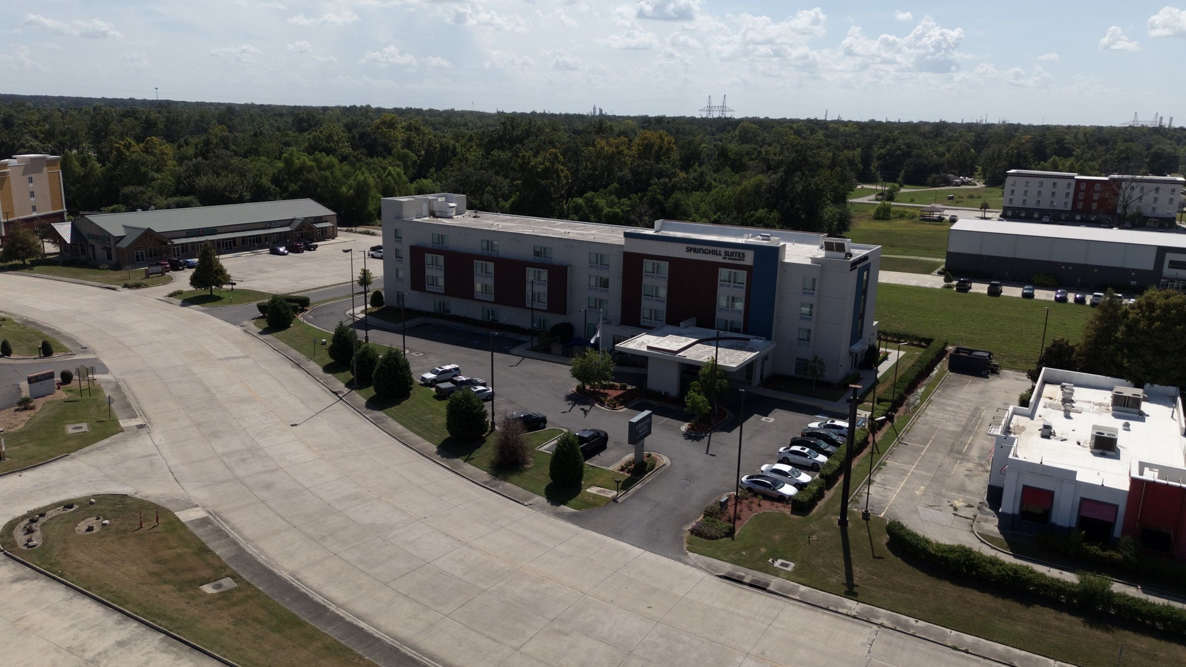 SpringHill Suites, aerial view of the hotel, entry drive, and foundation plantings