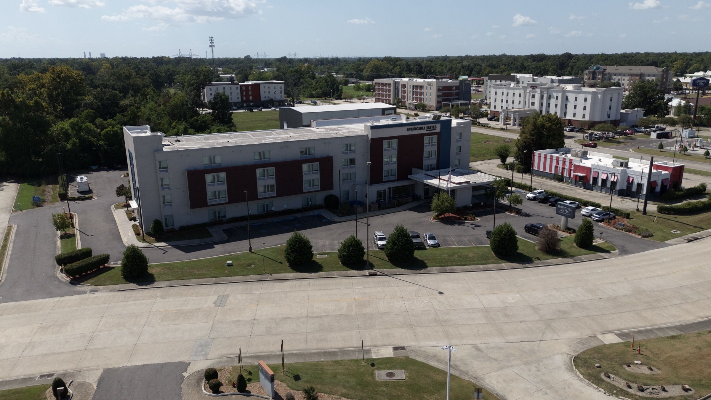 SpringHill Suites, aerial view of the property and landscaped approach